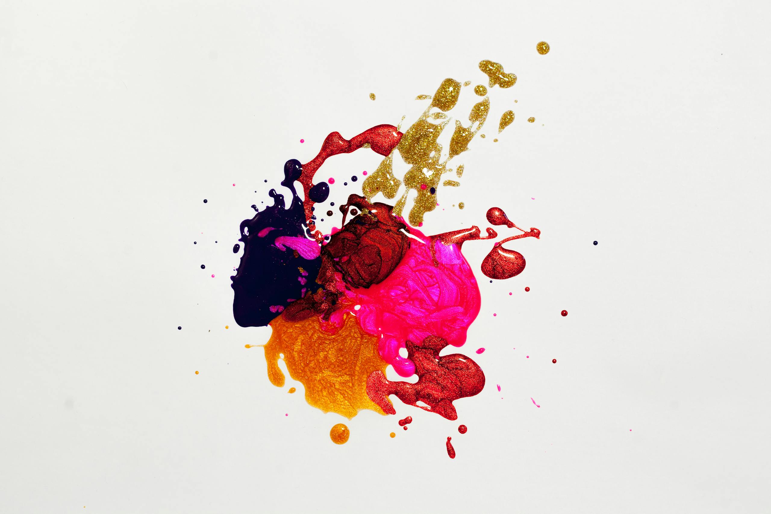 Colorful abstract paint splash on white background, capturing creative expression.